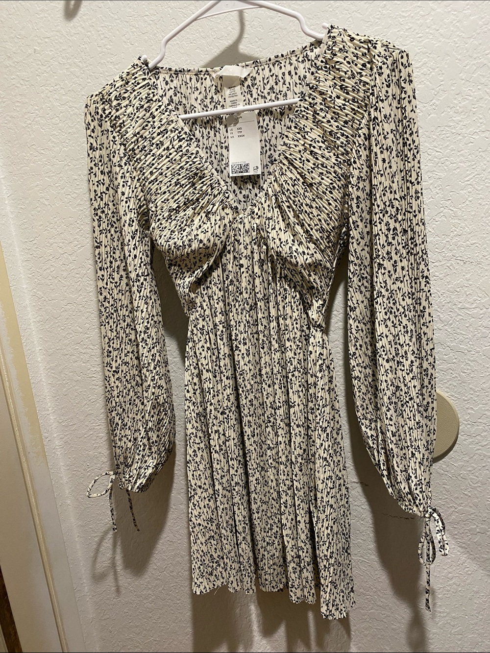 H&M Cream Long-Sleeve Pleated Mini Dress with Black Floral Print